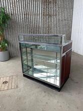 Antique style Antique glass counter with drawers  in Wood and glass, Europe