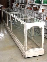 Antique style Antique long counter in Wood and glass, Europe 20th Century