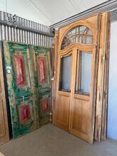 Antique style Art Deco doors in frame in Oak wood and glass, Europe