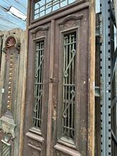 Antique style Doors in wood and iron, Europe 20e eeuw