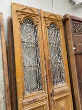 Antique style Antique doors in wood and iron