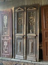 Antique style Antique doors in wood and iron