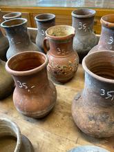 Antique style Antique pitchers in stone