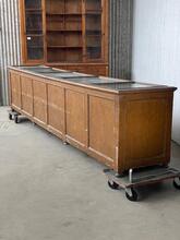 style Antique shop counter with drawers and glass