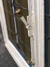 Antique style Stained glass in window in Wood and glass