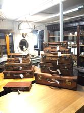 Antique style Antique suitcases in leather, England